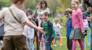 Children playing games at Warwick Castle at Boundless Member's Day